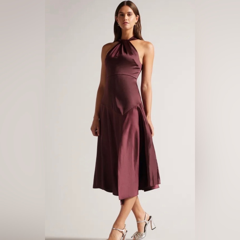 - Deep-purple Ted Baker midi dress
- Twisted halterneck
- A-line
- Side slit